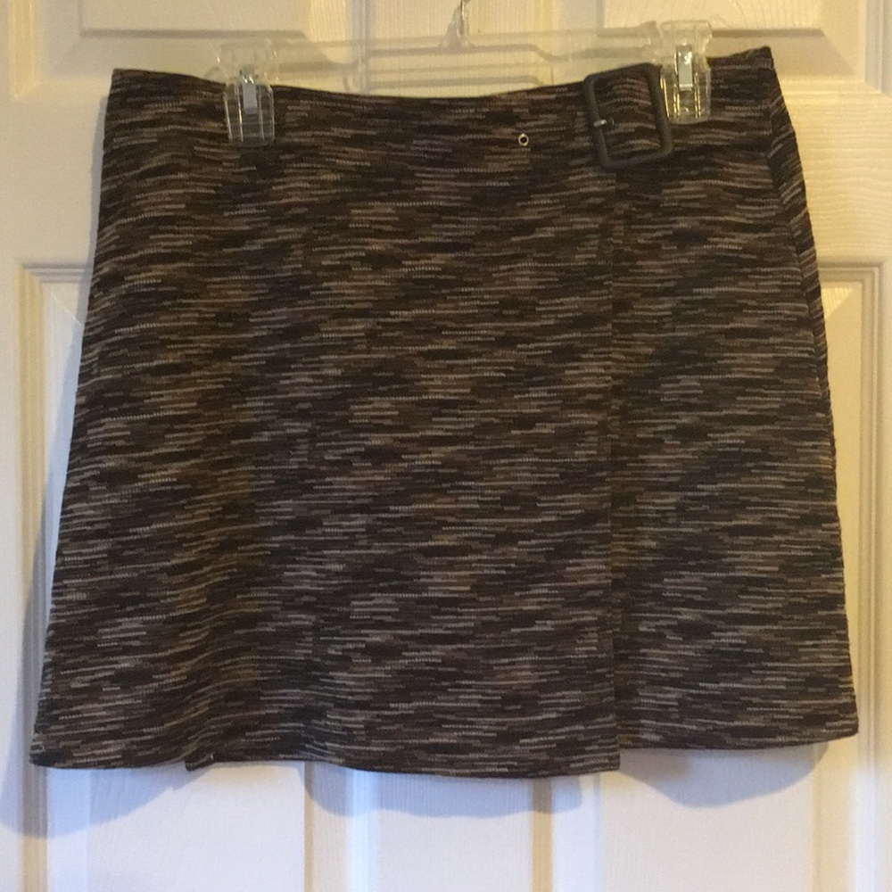 Express wrap min skirt with buckle detail.